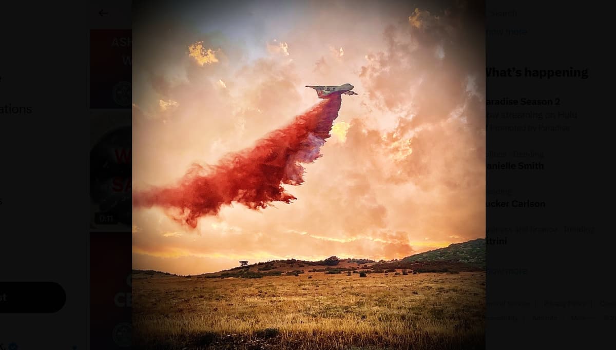 Boulder Office of Disaster Management via X. Fire retardant is dropped on the Stone Canyon and Lake Shore fires in Boulder County, Colorado, on August 2, 2024.