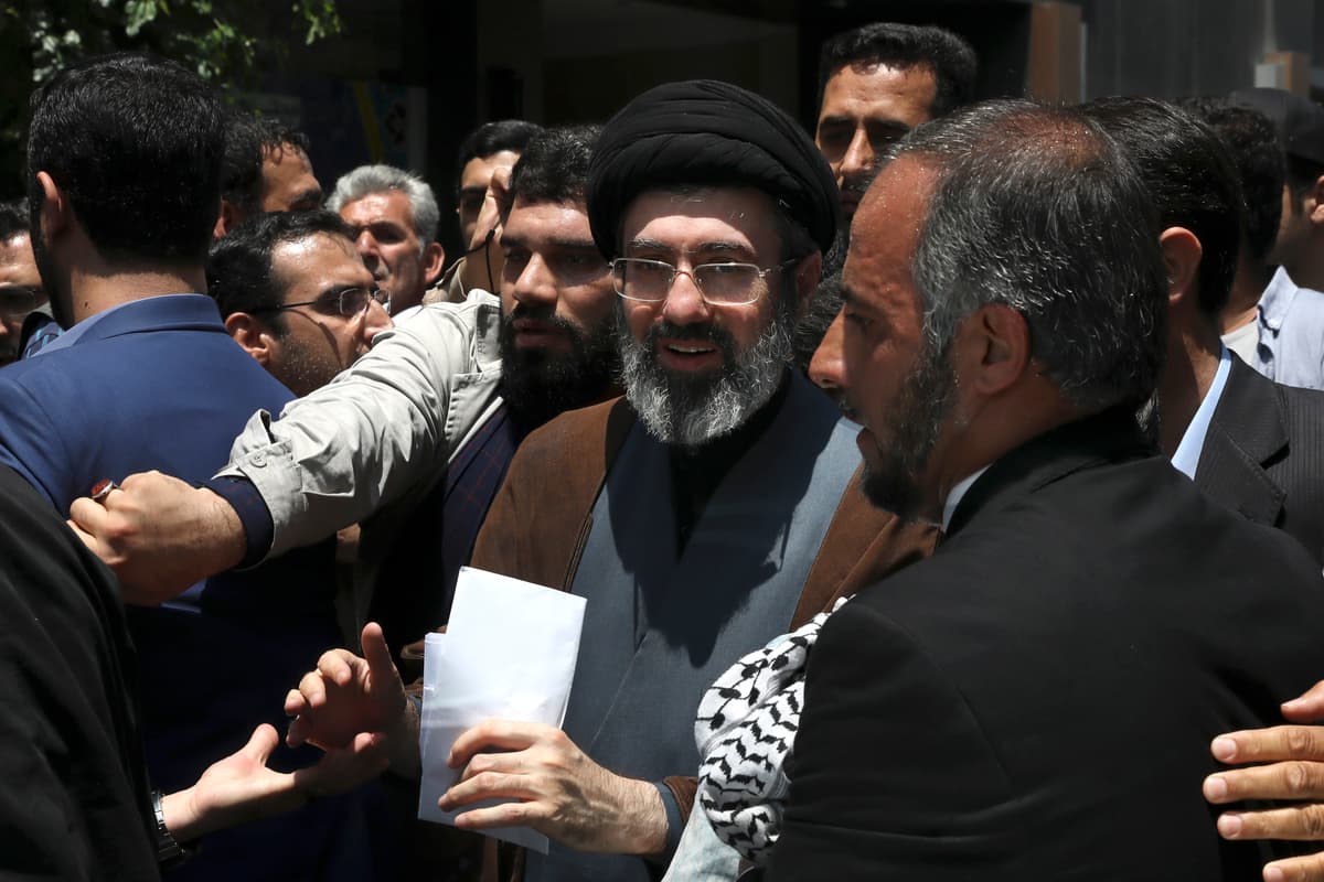 AP/Vahid Salemi Mojtaba, son of Iranian Supreme Leader Ayatollah Ali Khamenei, center, attends the annual Quds, or Jerusalem Day rally in Tehran, Iran, on May 31, 2019.