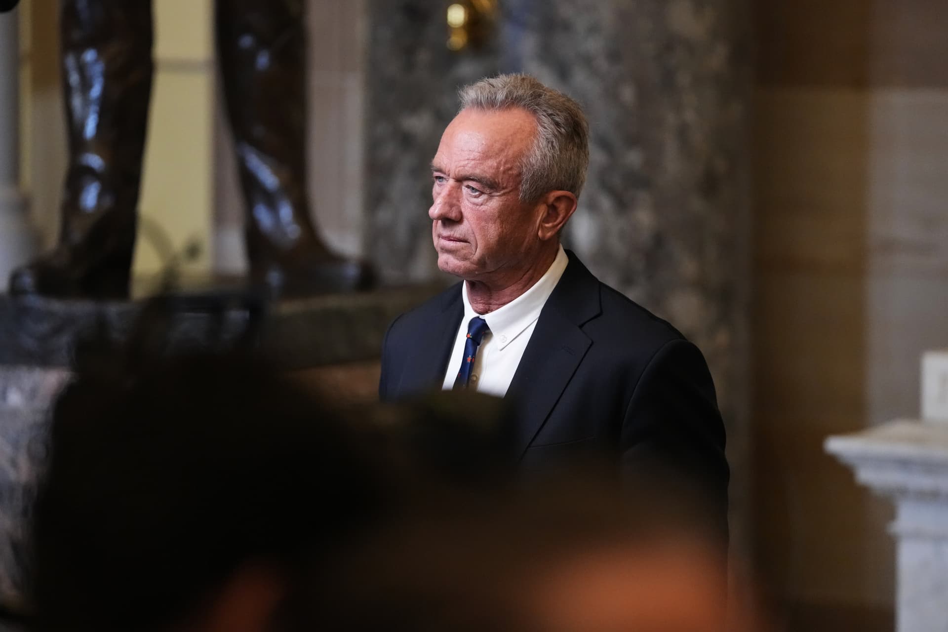 Allison Robbert/AP The health and human services secretary, Robert F. Kennedy Jr., watches President Trump's State of the Union address at the U.S. Capitol on February 24, 2026.