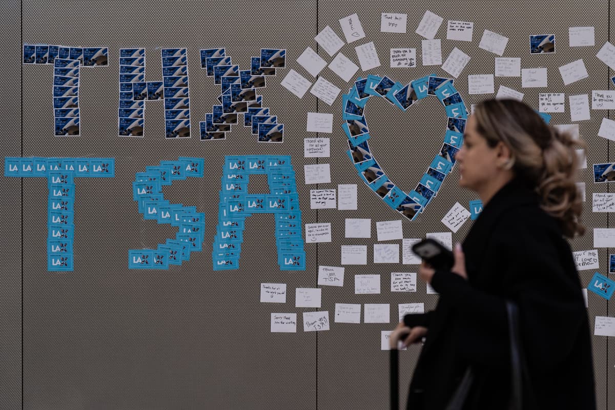 Jae C. Hong/AP A traveler walks past a display of thank-you notes for TSA agents at Los Angeles International Airport on March 27, 2026,