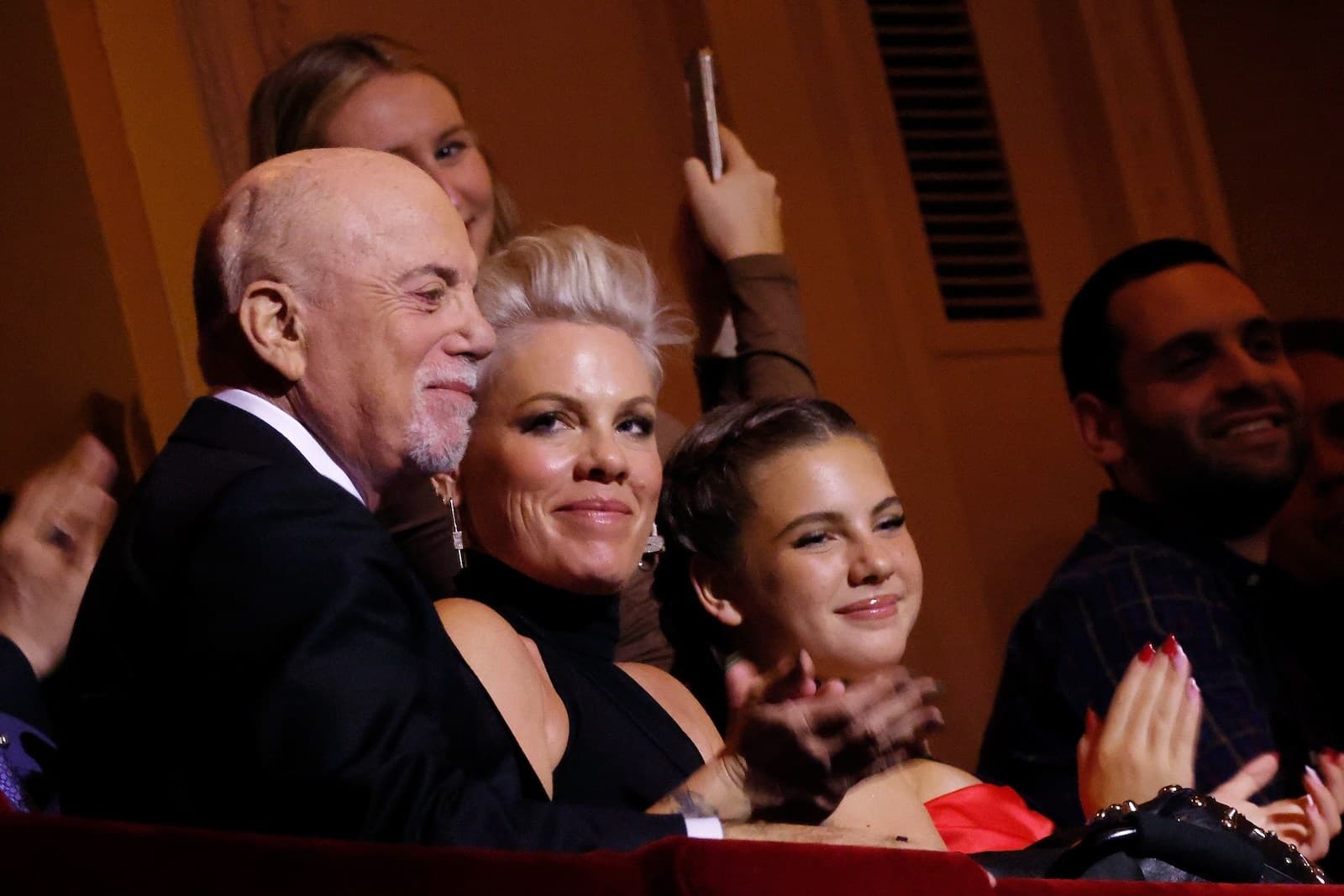 Getty Images Billy Joel at the Carnegie Hall tribute concert next to the singer Pink.