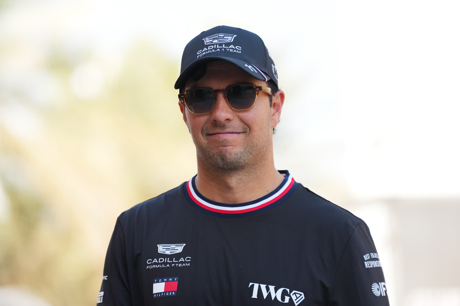 Sona Maleterova/Getty Images Sergio Perez of Mexico and Cadillac F1 Team looks on in the Paddock during day three of F1 Testing at Bahrain International Circuit on February 20, 2026 in Bahrain.