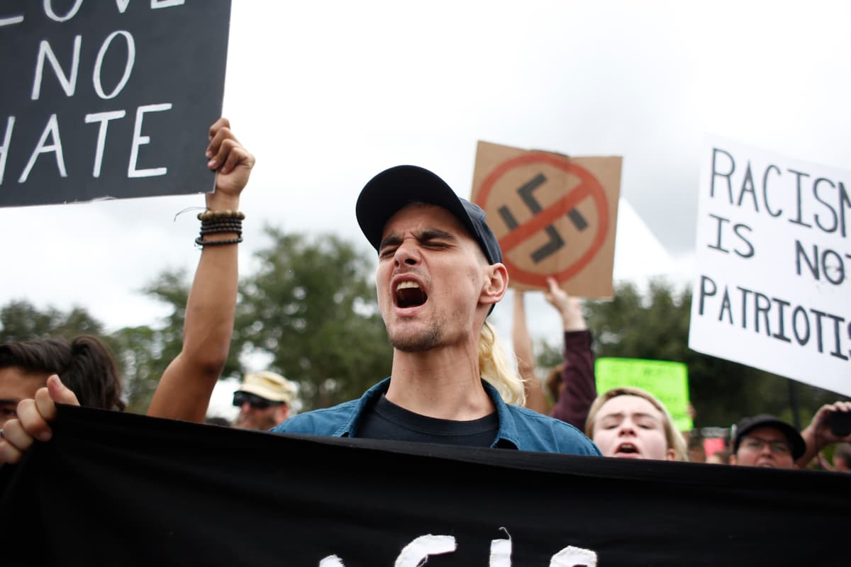 Brian Blanco/Getty Images Demonstrators gather at the site of a planned speech by white nationalist Richard Spencer, who popularized the term 'alt-right', at the University of Florida campus on October 19, 2017.
