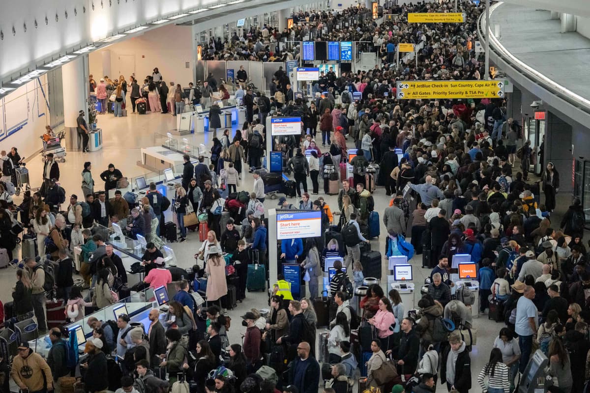 AP/Yuki Iwamura People wait in a TSA line at the John F. Kennedy International Airport, Sunday, March 22, 2026.