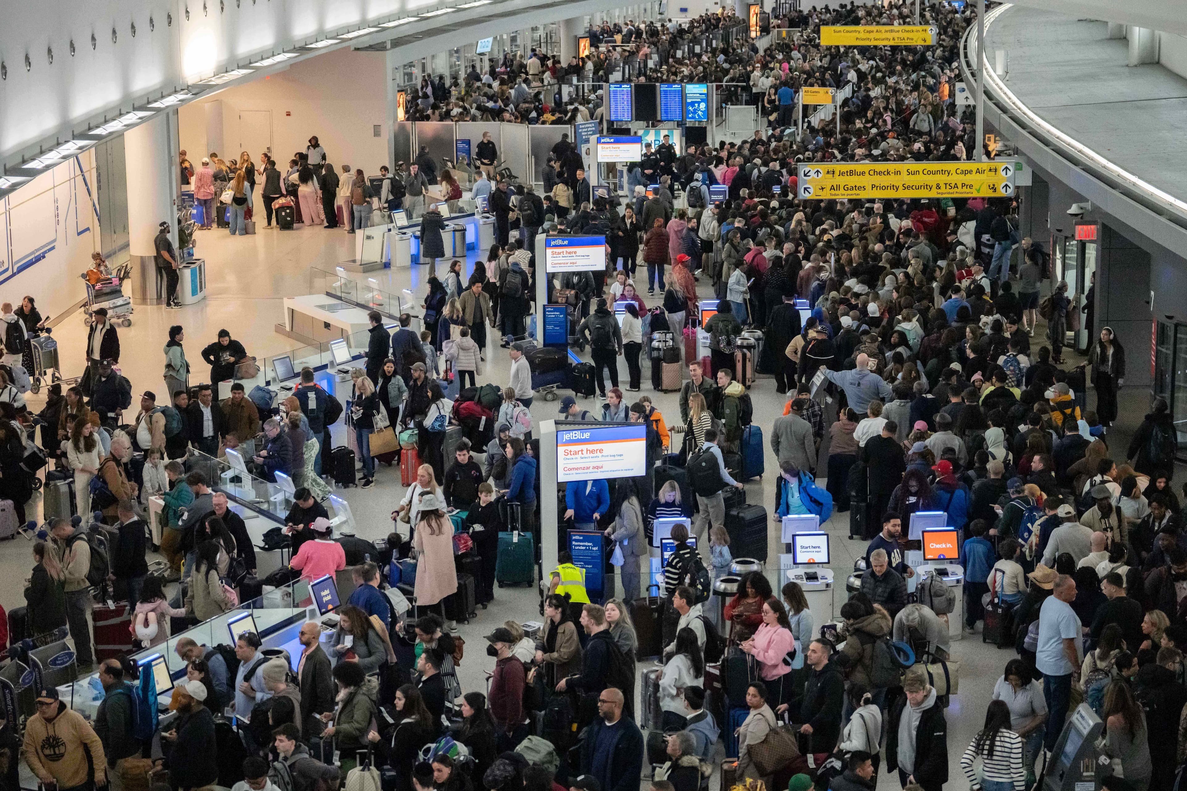 People wait in a TSA line at the John F. Kennedy International Airport, March 22, 2026. People wait in a TSA line at the John F. Kennedy International Airport, March 22, 2026.