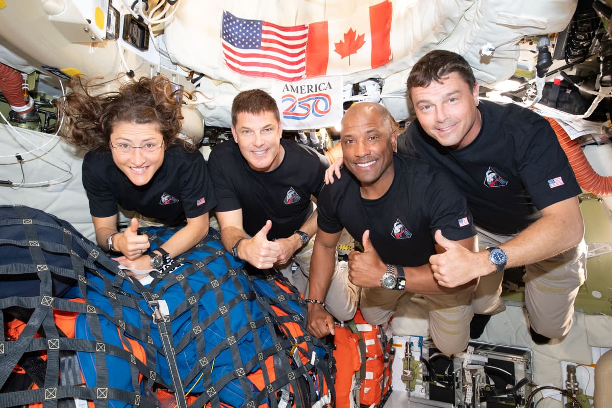 NASA via Getty Images The Artemis II crew — Mission Specialist Christina Koch, Mission Specialist Jeremy Hansen, Pilot Victor Glover, and Commander Reid Wiseman — pauses for a group photo inside the Orion spacecraft on their way home.