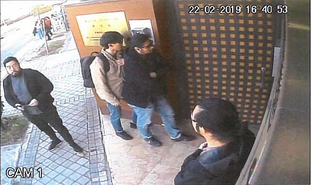 Spanish Guardia Civil via Wikimedia Commons Christopher Ahn, left, is seen with other members of “Free Joseon” in a surveillance video captured shortly before they entered the North Korean embassy at Madrid on February 22, 2019.