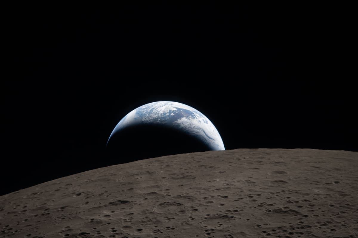 Via NASA Earth captured through the Orion spacecraft window at 6:41 p.m. EDT, April 6, 2026, during the Artemis II crew’s flyby of the Moon.
