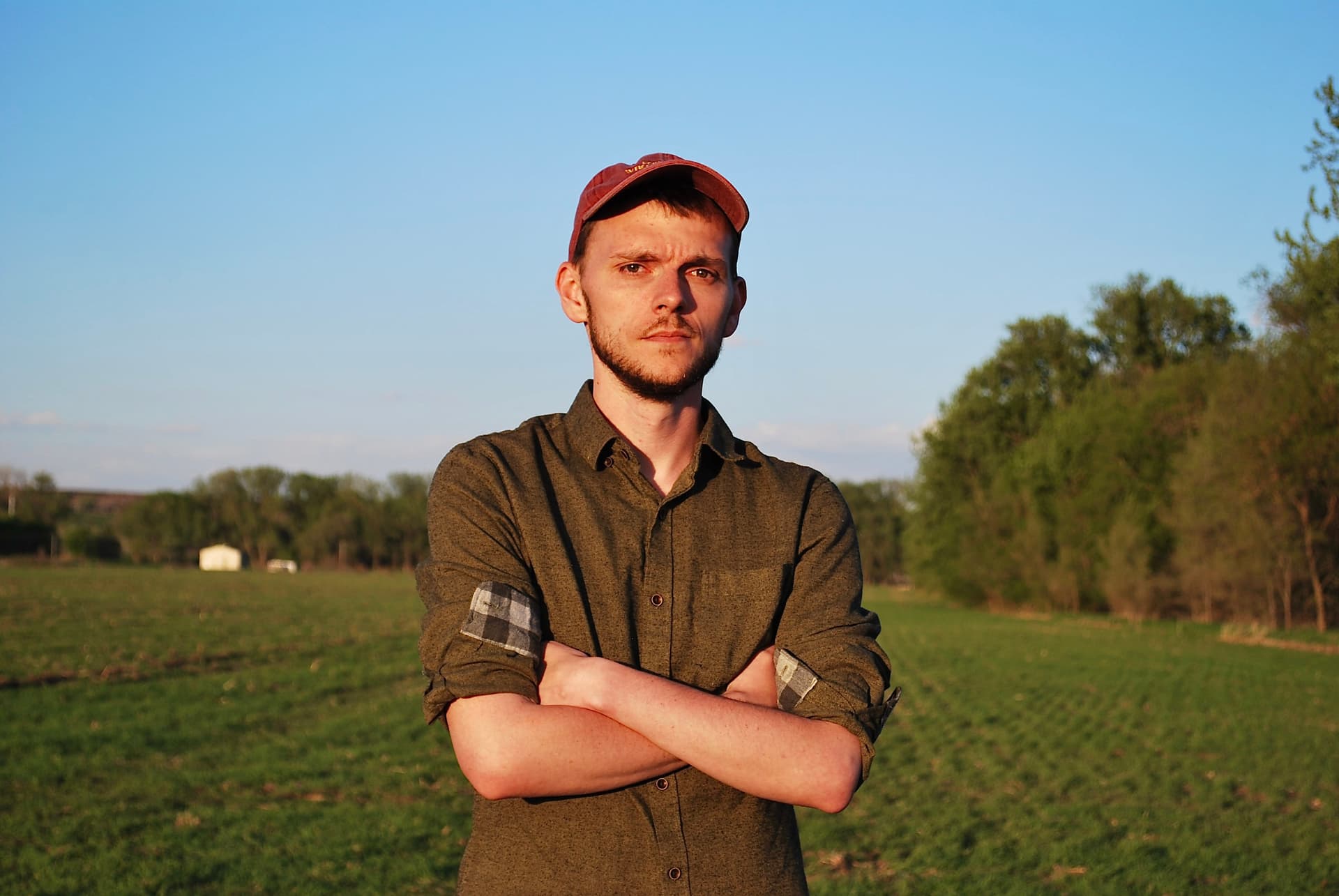 ahlmanfornebraska.com Austin Ahlman, the son of meatpackers from Norfolk, Nebraska, has worked as a reporter covering corporate power, congressional stock trading, and tech lobbying.