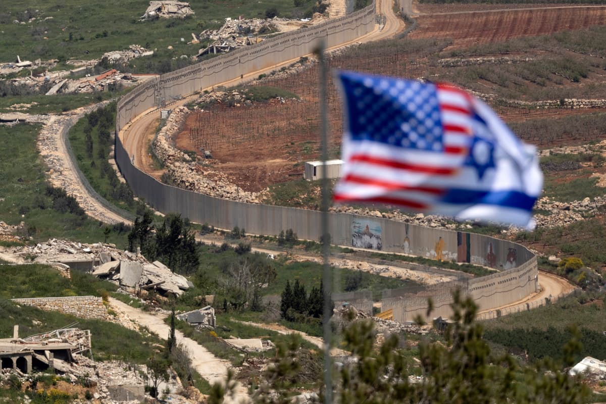 Amir Levy/Getty Images An Israeli and American flag is seen from northern Israel near the border with southern Lebanon on April 29, 2026.