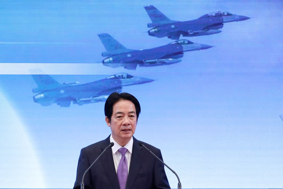 Chiang Ying-ying/AP President Lai Ching-te of Free China speaks in front of a video screen showing jet fighters in flight during a press conference at Taipei, Taiwan, on May 20, 2026.