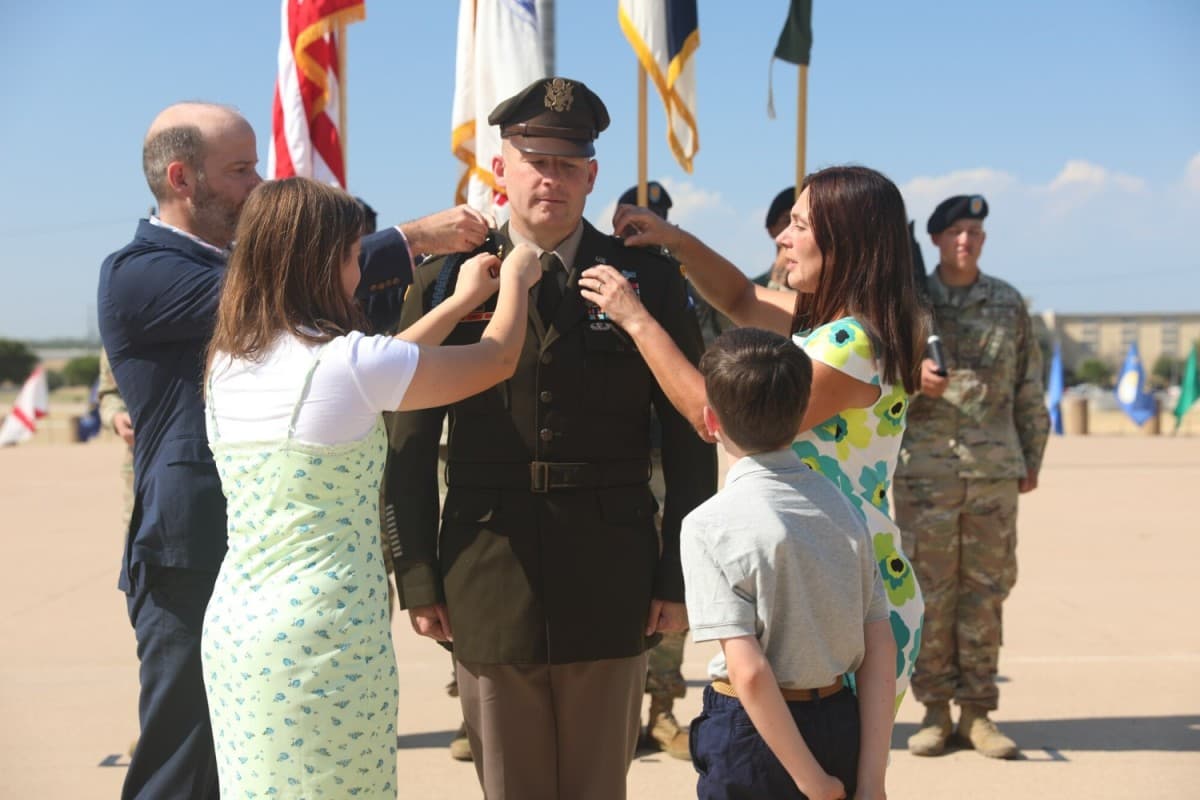 U.S. Army photo by Sgt. 1st Class Angela Holtby via Wikimedia Commons U.S. Army Brigadier General Matthew W. Brown's new rank is placed on his uniform by his family in July 2022 in a ceremony in Fort Hood, Texas.