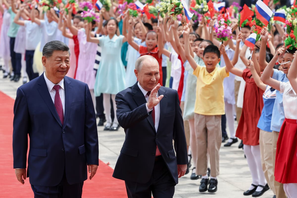 Alexander Kazakov, Sputnik, Kremlin pool via AP President Vladimir Putin, center, and President Xi Jinping attend a welcome ceremony at the Great Hall of the People, Beijing, May 20, 2026.