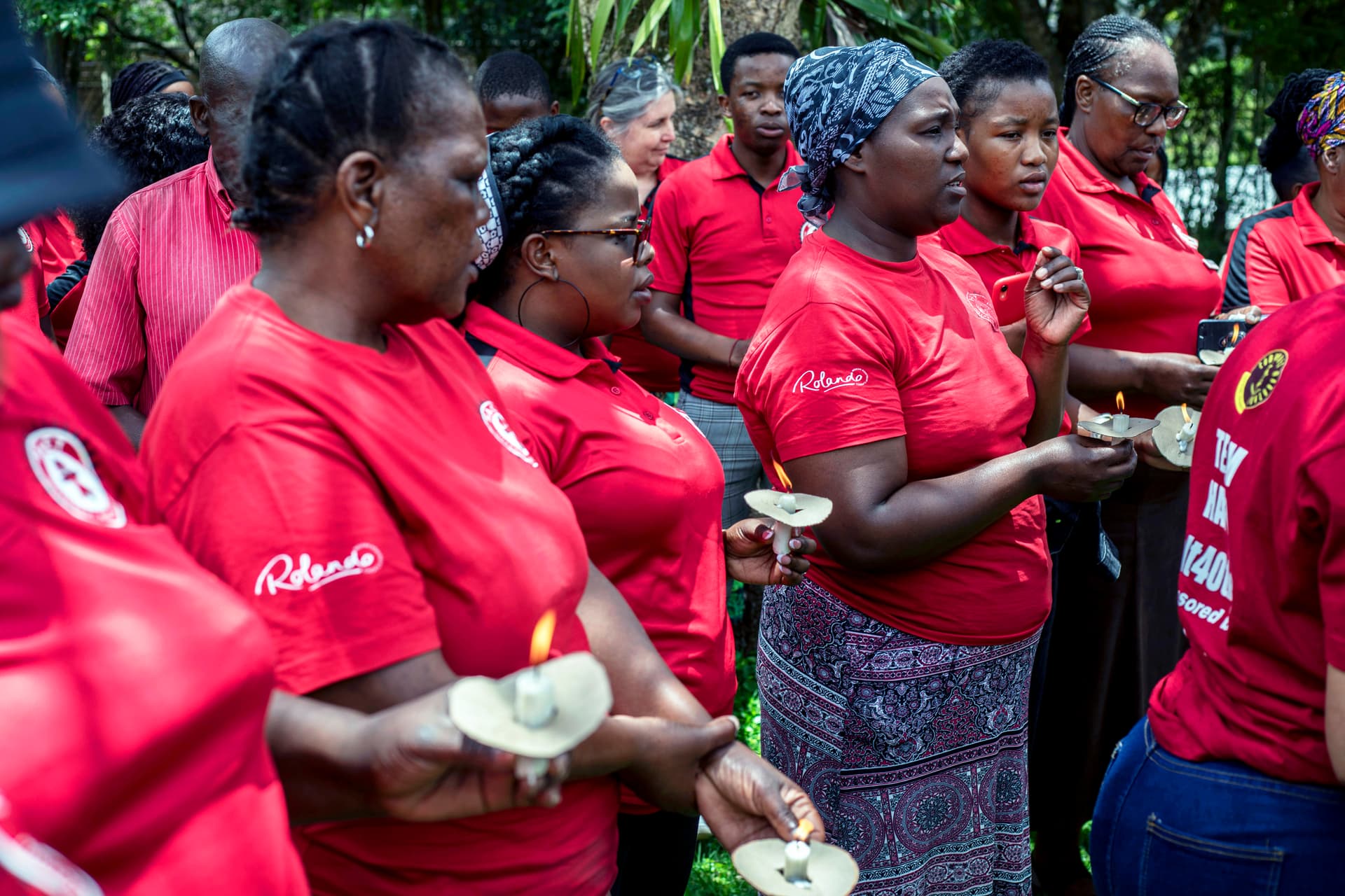Per-Anders Pettersson/Getty Images AIDS center staffers lights candles at Hillcrest, South Africa, near Durban, to remember the 85 patients who died in their hospice over the previous year on World Aids Day December 1, 2025.