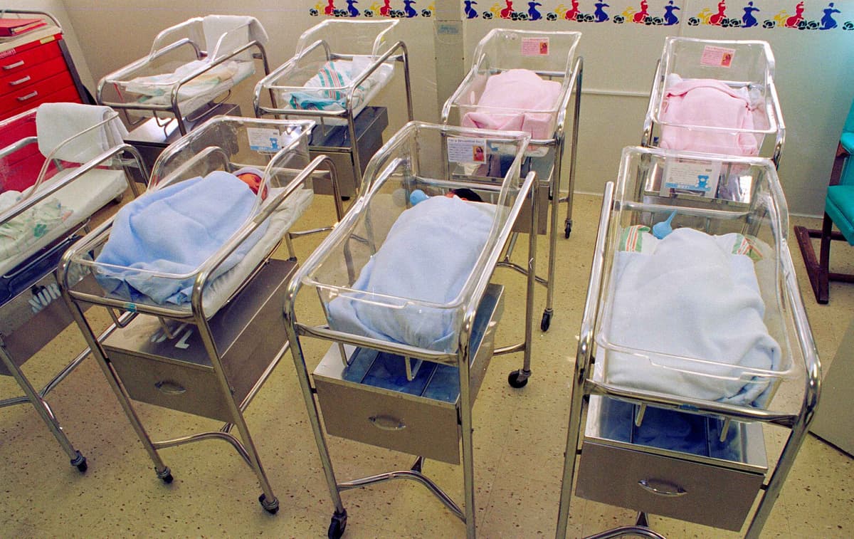 Bob Riha, Jr./Getty Images Newborn infants rest in their cribs at Los Angeles County USC Medical Center on January 13, 1999.