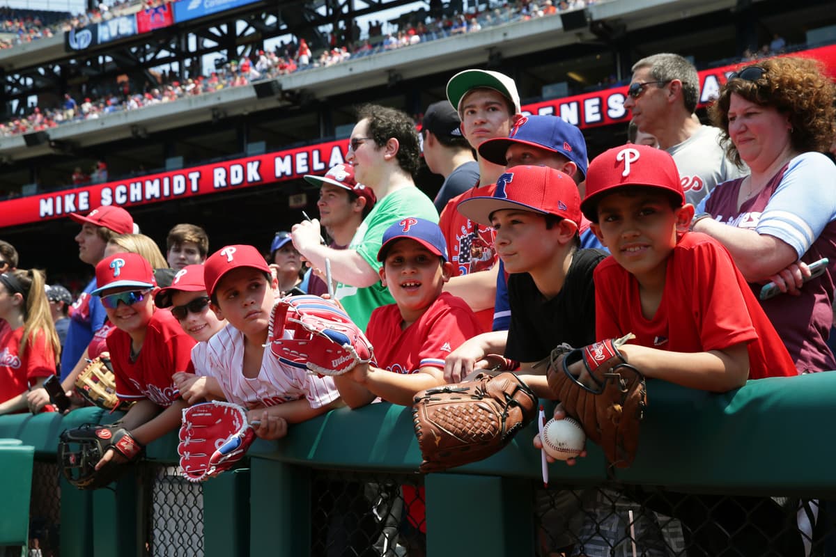Hunter Martin/Getty Images The lifespan of boys like these young fans attending a Philadelphia Phillies game at Philadelphia, Pennsylvania, on May 19, 2019, may be affected by the age at which they begin puberty, studies show.