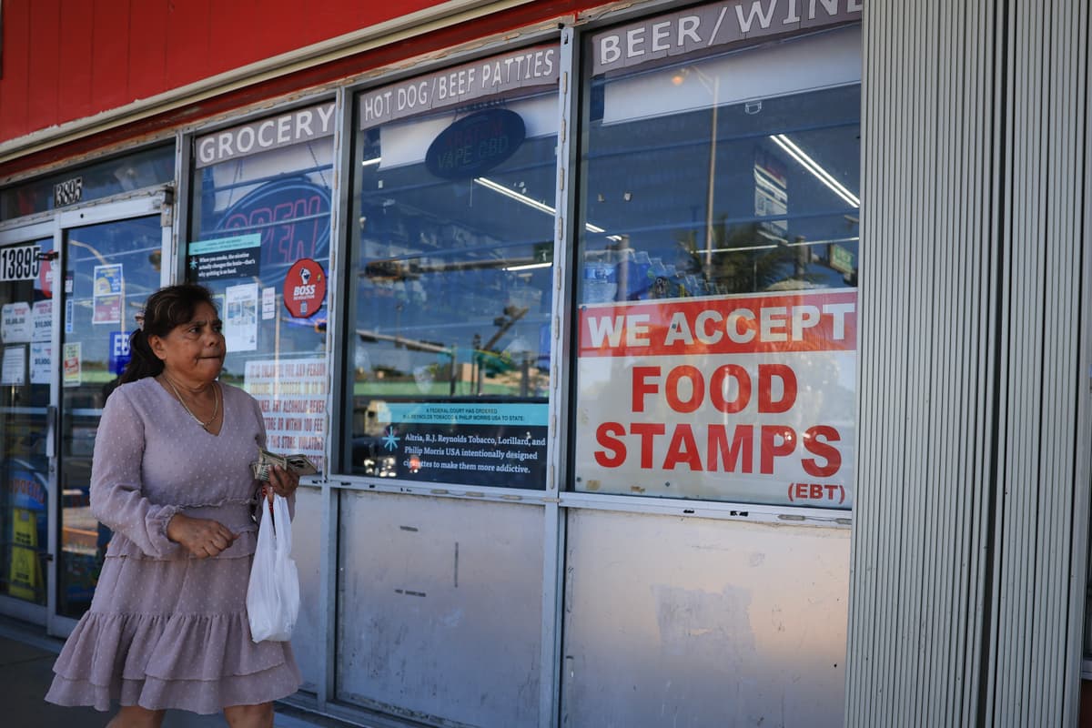 Joe Raedle/Getty Images A 'We Accept Food Stamps' sign hangs in the window of a grocery store at Miami, Florida, on October 31, 2025.