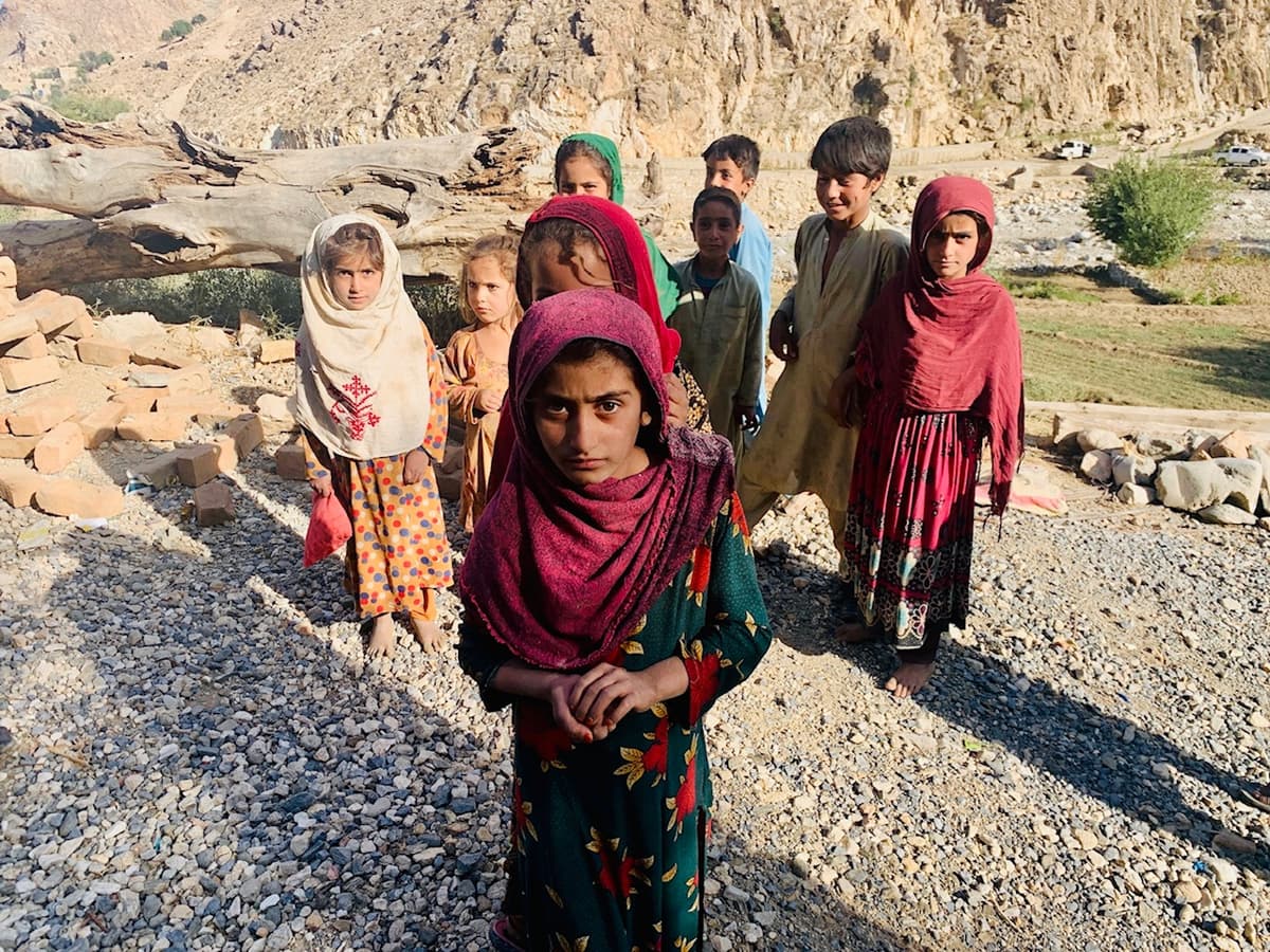 Hollie McKay/The New York Sun Afghan children playing outside in Kandahar, Afghanistan, October 19, 2021.