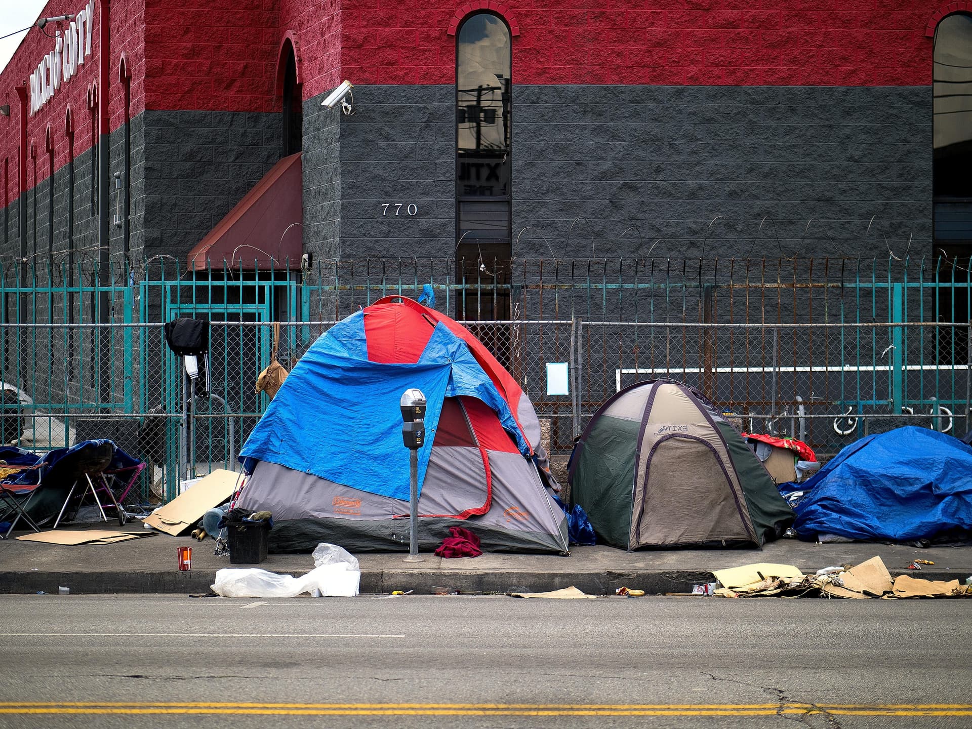 Milan Cobanav via Pexels.com Tents belonging to the homeless line the sidewalk at Los Angeles.