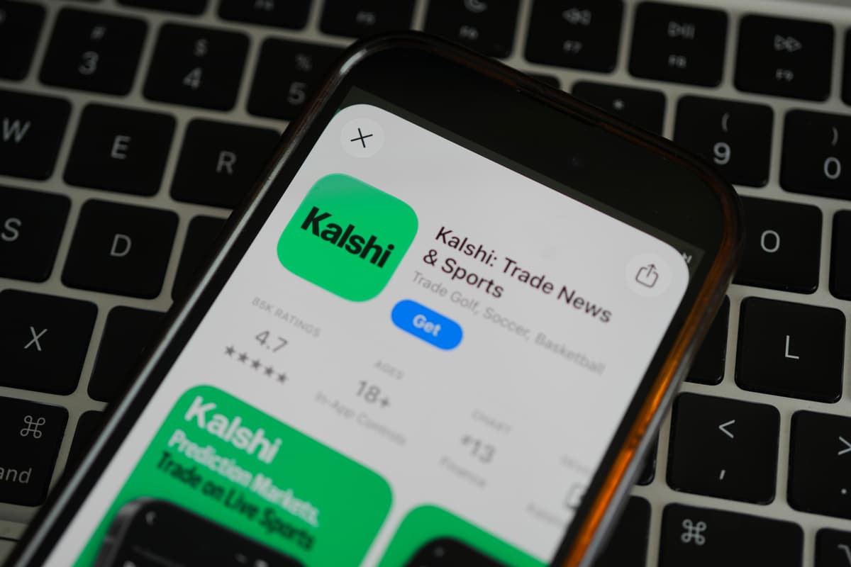 Erin Hooley/AP An ad for the prediction market app Kalshi is displayed on a mobile phone at Chicago on April 16, 2026.