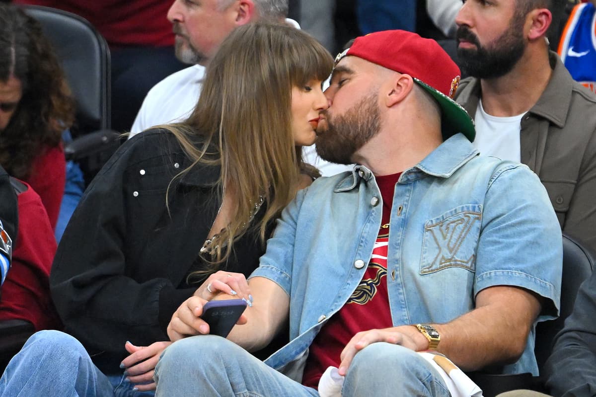 Jason Miller/Getty Images Taylor Swift and Travis Kelce kiss during Game Three between the New York Knicks and the Cleveland Cavaliers at Rocket Arena on May 23, 2026 in Cleveland, Ohio.
