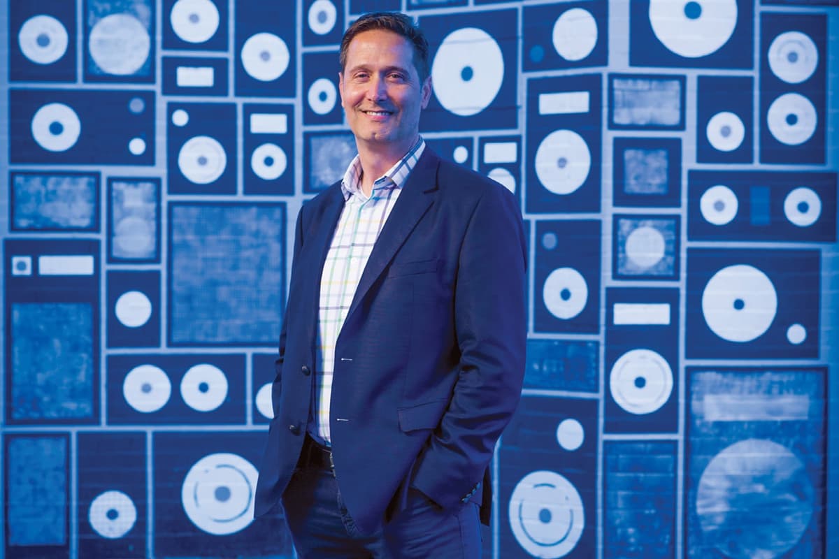 Vanderbilt University via Facebook The chairman and CEO of the Recording Industry Association of America, Mitch Glazier, poses in a music store at Nashville, Tennessee, in November 2018.