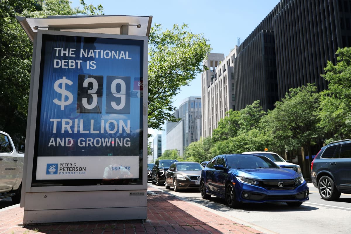 Tasos Katopodis/Getty Images A Peterson Foundation bus stop sign at Washington, D.C., displays the national debt as of June 12, 2026.