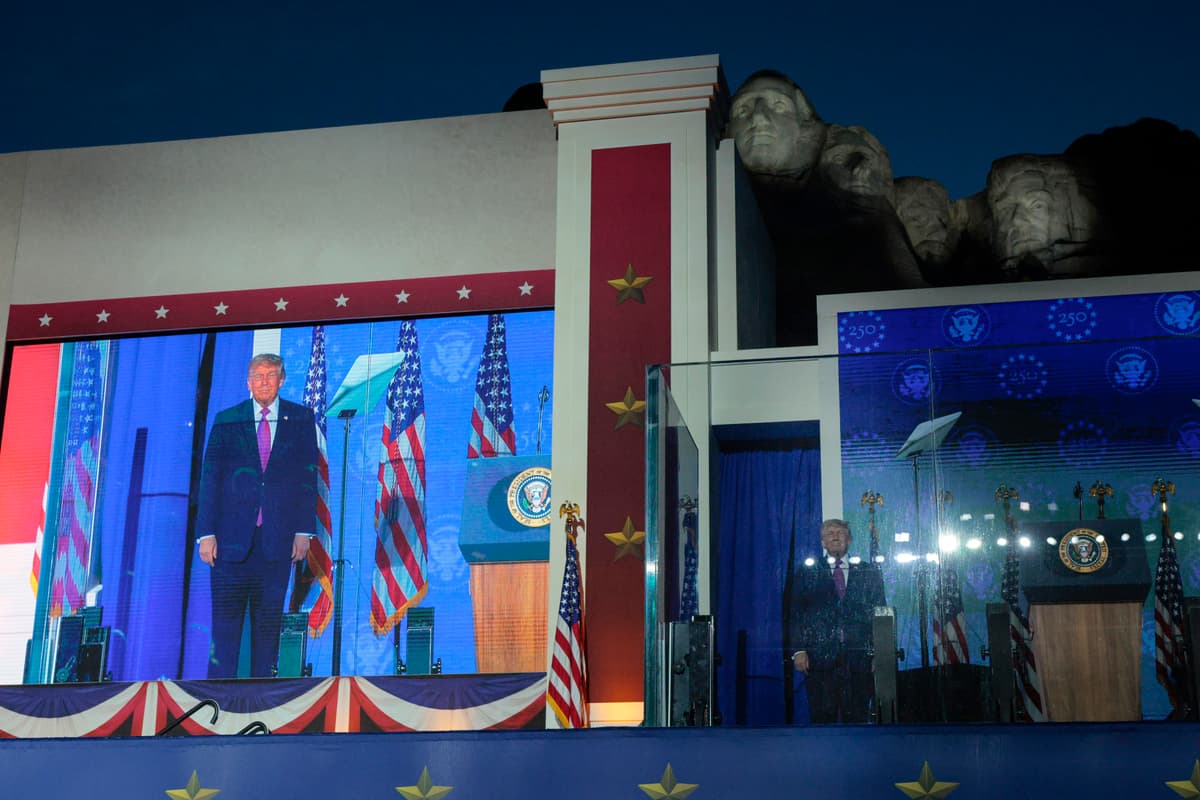 Chip Somodevilla/Getty Images President Trump’s image is seen on a giant video screen as he arrives for a speech at Mount Rushmore near Keystone, South Dakota, on July 3, 2026.