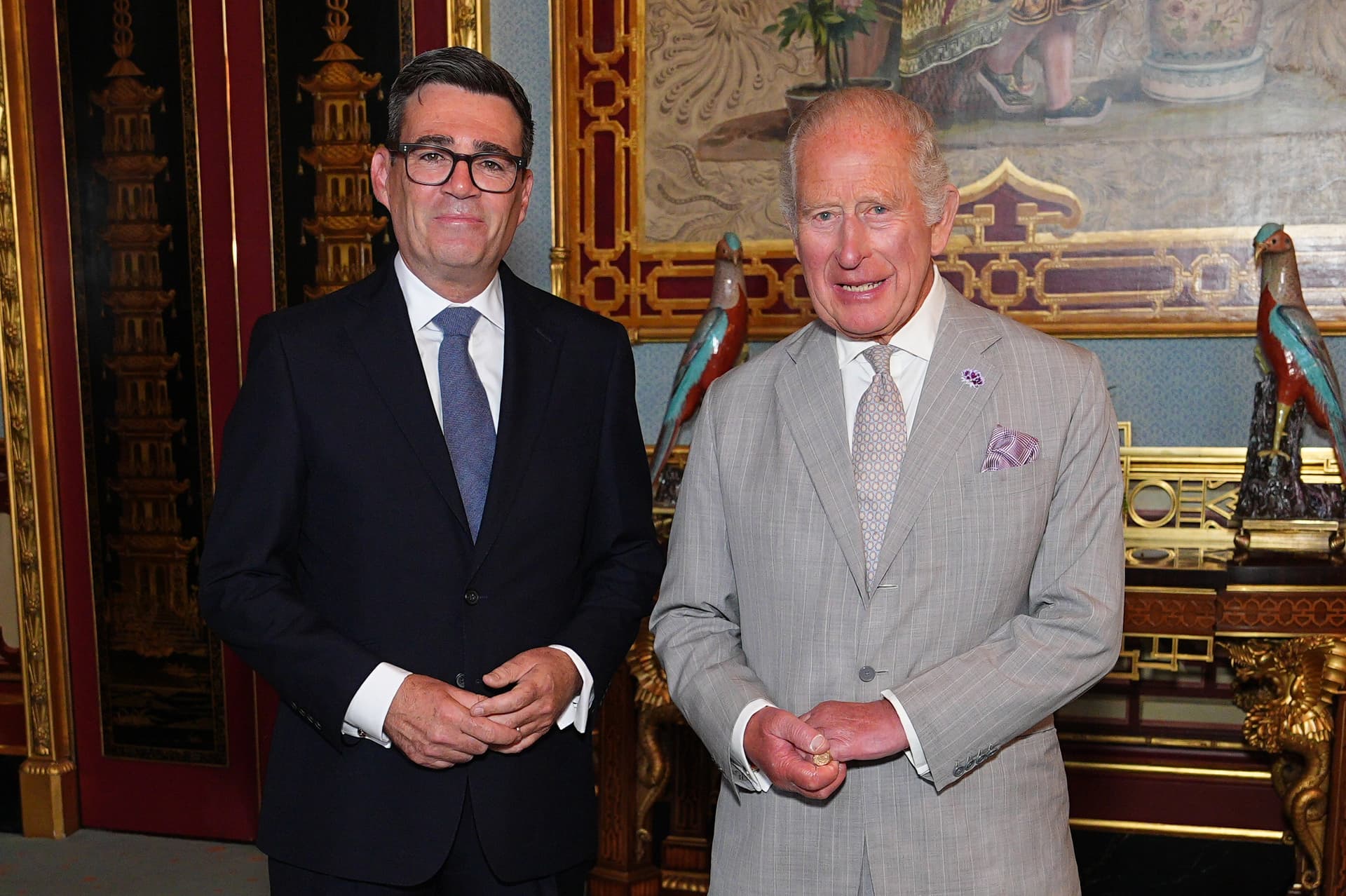 Aaron Chown/Getty Images King Charles III welcomes Andy Burnham, during an audience at Buckingham Palace where he invited the leader of the Labour Party to become Prime Minister and form a new government on July 20, 2026.
