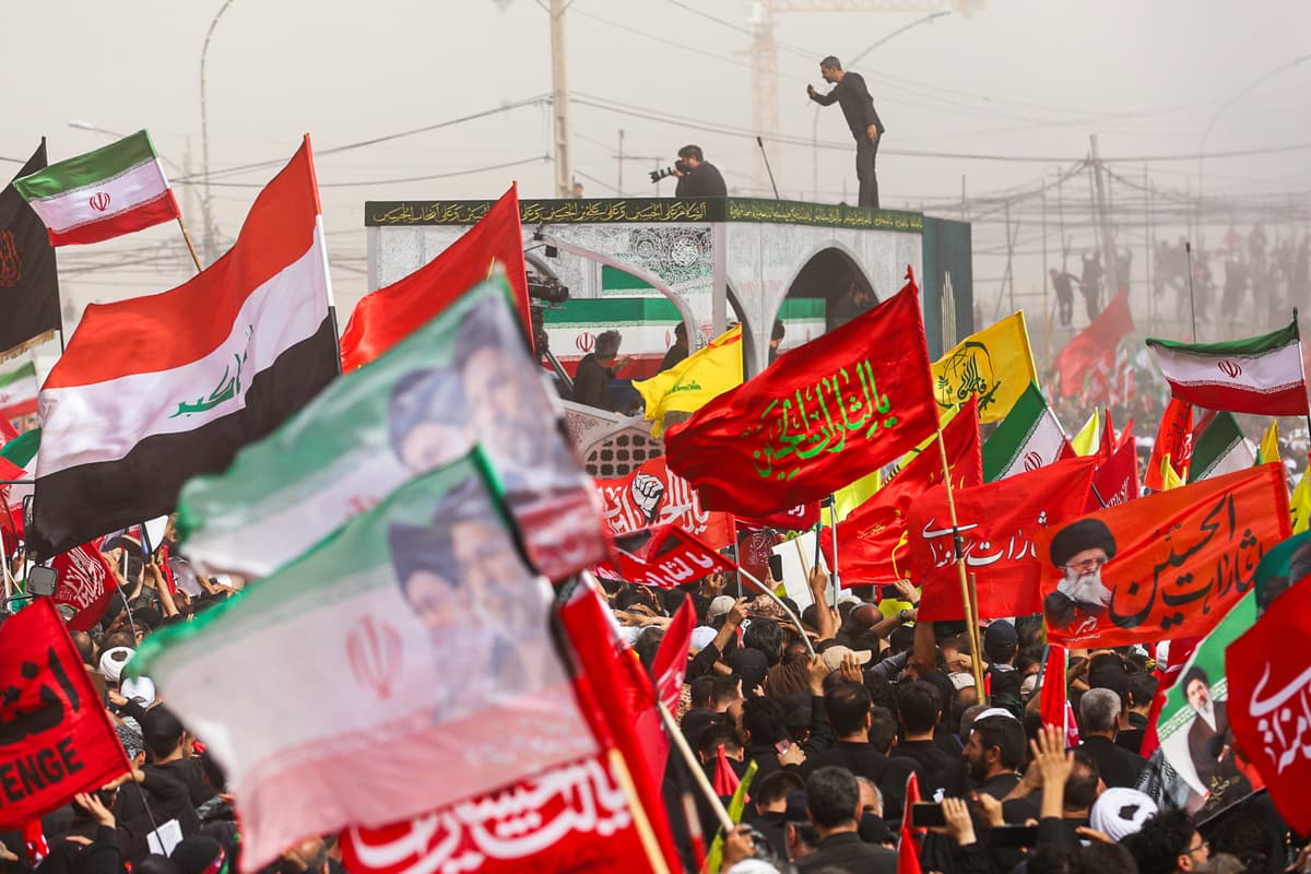 Mohammad Asadi/ISNA via AP A truck carrying the coffins of the late Iranian Supreme Leader Ayatollah Ali Khamenei and members of his family makes its way through mourners during the funeral procession in Qom, the heart of religious studies in Iran, July 7, 2026.