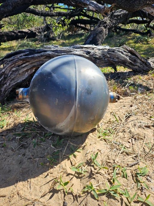 via Australian Space Agency A titanium sphere from a spacecraft washed up on an Australian beach.