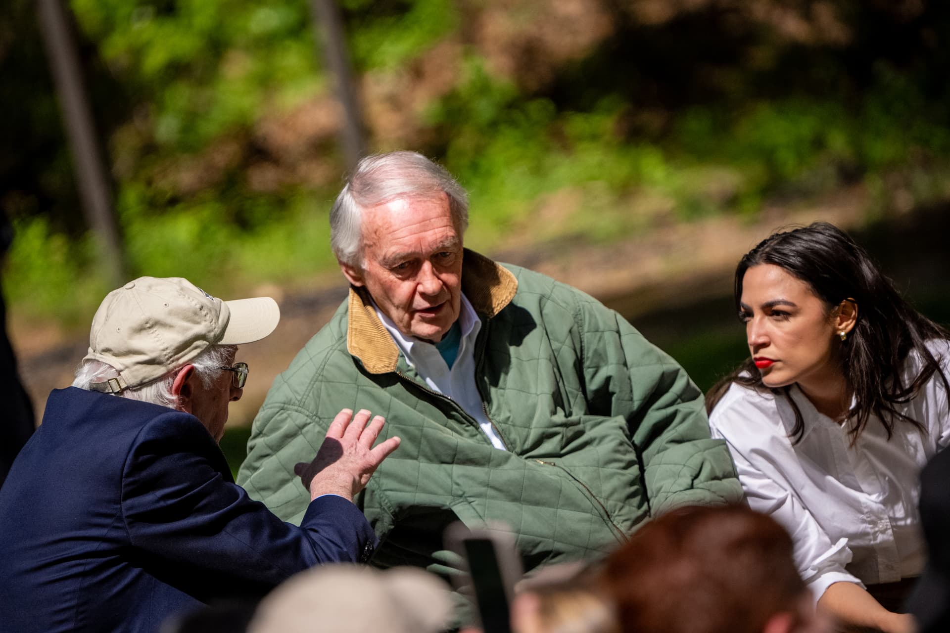 Andrew Harnik/Getty Images Congresswoman Alexandria Ocasio-Cortez, Senator Edward Markey and Senator Bernie Sanders speak before President Biden takes the stage on Earth Day April 22, 2024.