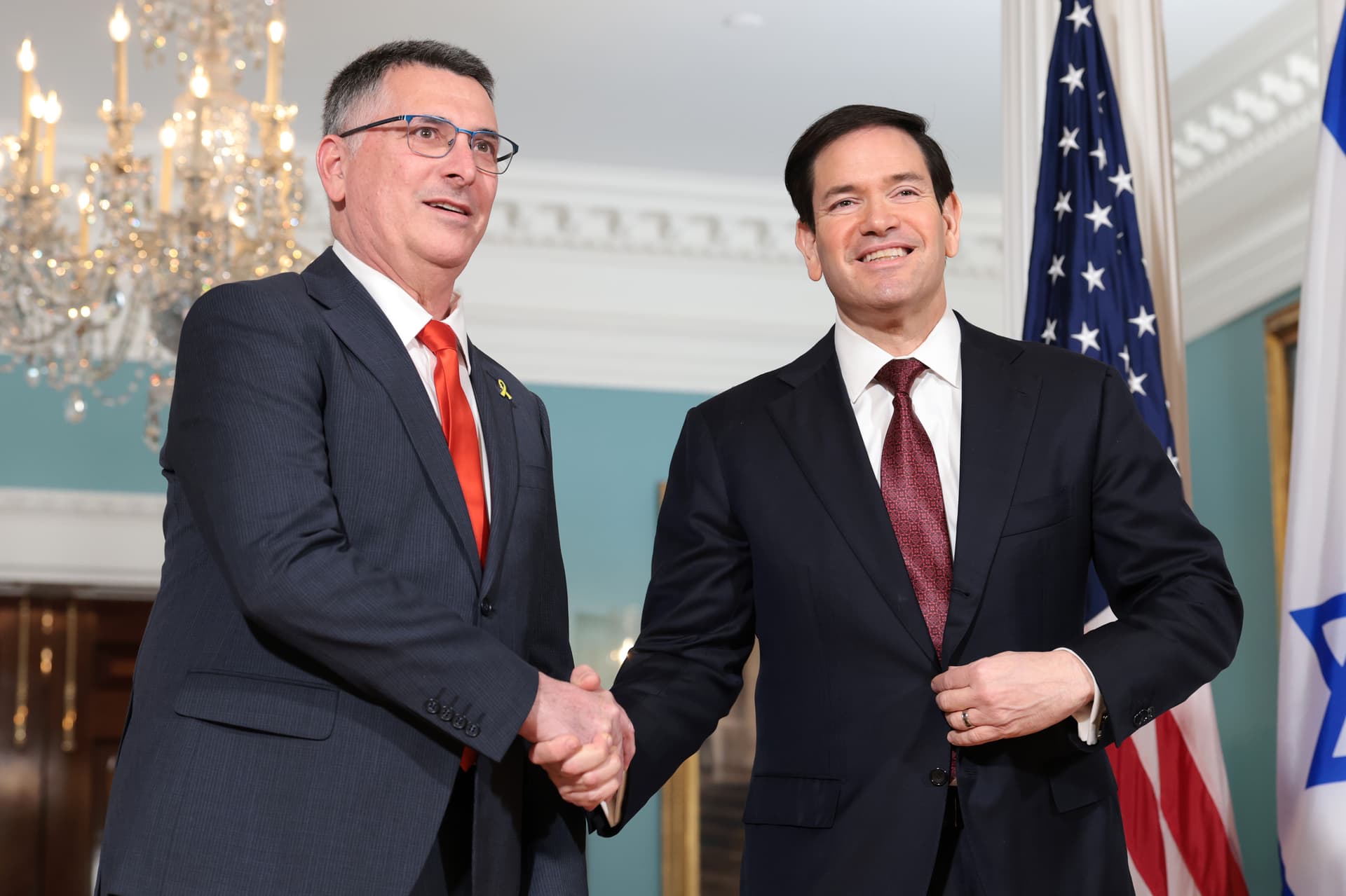 Anna Moneymaker/Getty Images Israeli Foreign Minister Gideon Sa’ar and Secretary of State Marco Rubio pose for photos during a meeting at the State Department on December 10, 2025.