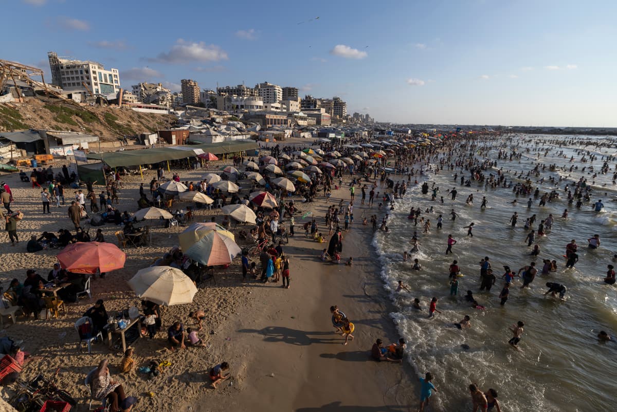 Omar Ashtawy/Getty Images Palestinians enjoy the beach on August 7, 2026, at Gaza City, Gaza. A fragile truce has been in place since last October, two years after the outbreak of war between Israel and Hamas in 2023.