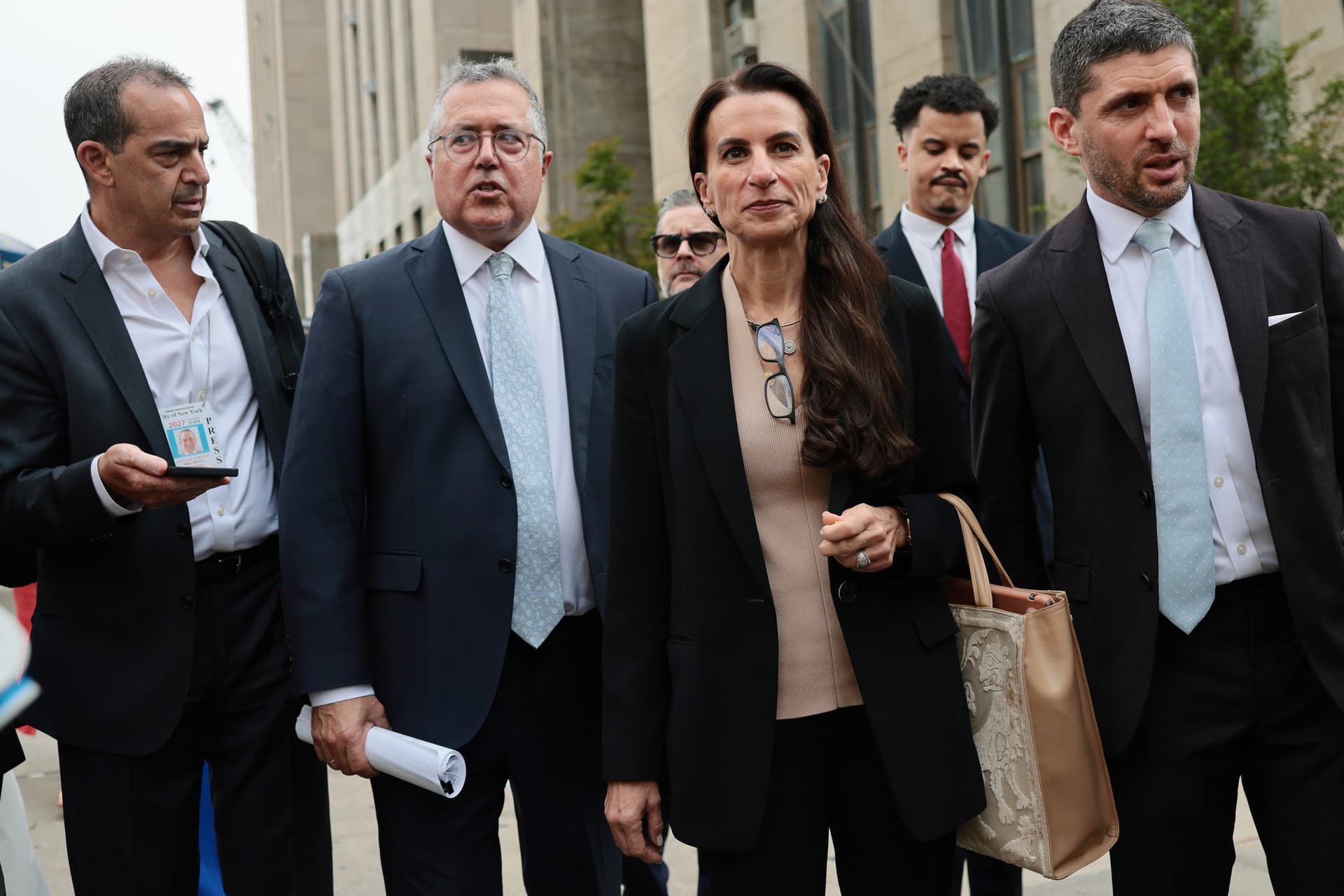 Michael M. Santiago/Getty Images Attorneys for Luigi Mangione, Marc Agnifilo and Karen Friedman Agnifilo, depart after a pretrial hearing at New York State Supreme Court on August 11, 2026, at New York City.