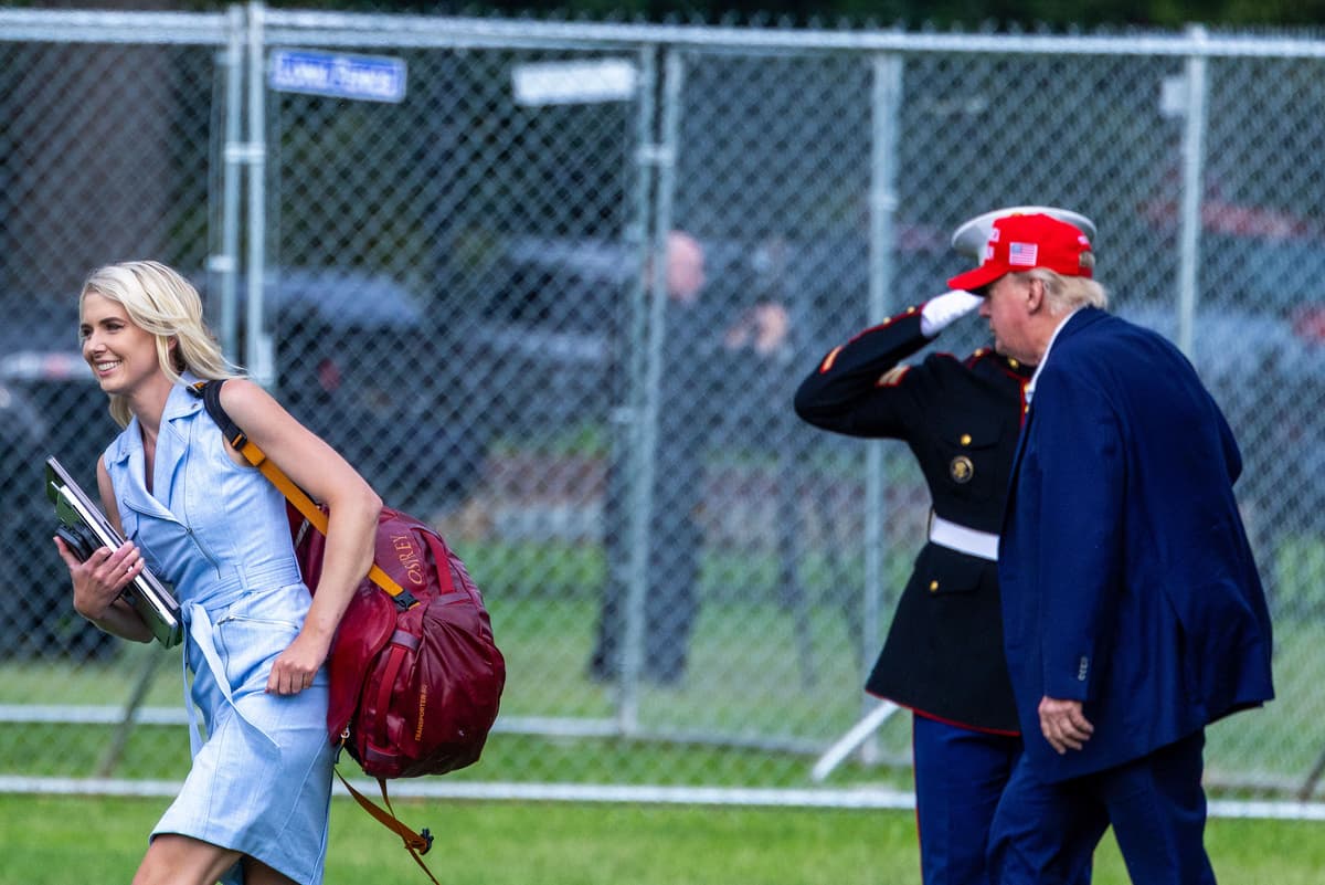 Tasos Katopodis/Getty Images President Trump and Natalie Harp, his aide, walk after landing at the Ellipse near the White House on August 16, 2026 at Washington, D.C.