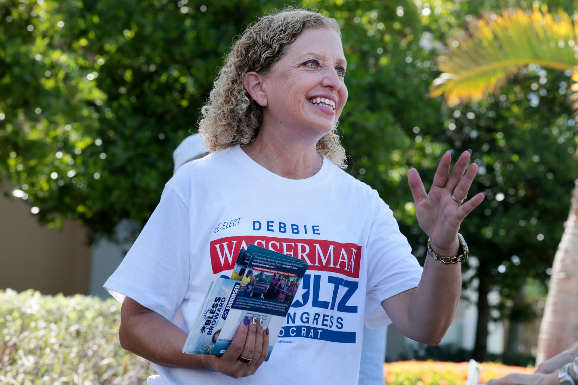 Joe Raedle/Getty Images Debbie Wasserman Schultz campaigns outside of the Kings Point Clubhouse polling station on August 18, 2026, in Tamarac, Florida.