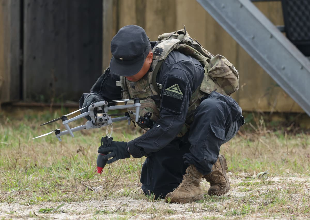 Sean Gallup/Getty Images A member of the U.S. Army 7th Army Training Command, clad in black in the role of opposition force, prepares an Autel FPV drone carrying live training bomblets during a demonstration for the media at the Saber Junction 26 combined military exercise at the U.S. Army Joint Multinational Readiness Center on August 26, 2026, near Hohenfels, Germany. The U.S. military is testing and acquiring a wide range of drone capabilities in response to the new combat realities born out of the ongoing Russian war in Ukraine.