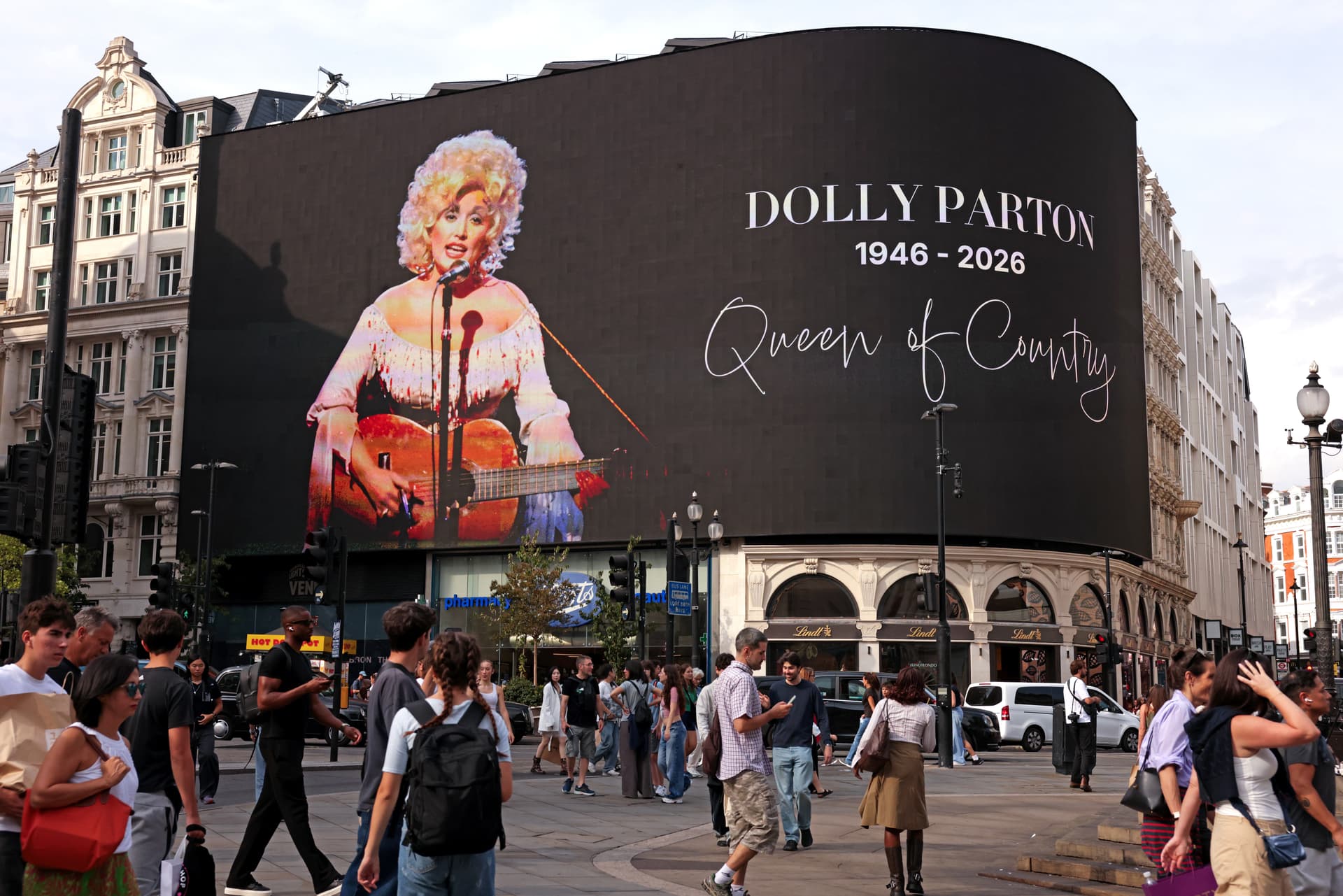 Simon Ackerman/Getty Images Piccadilly Lights pay tribute to Dolly Parton at London, England, on August 26, 2026.