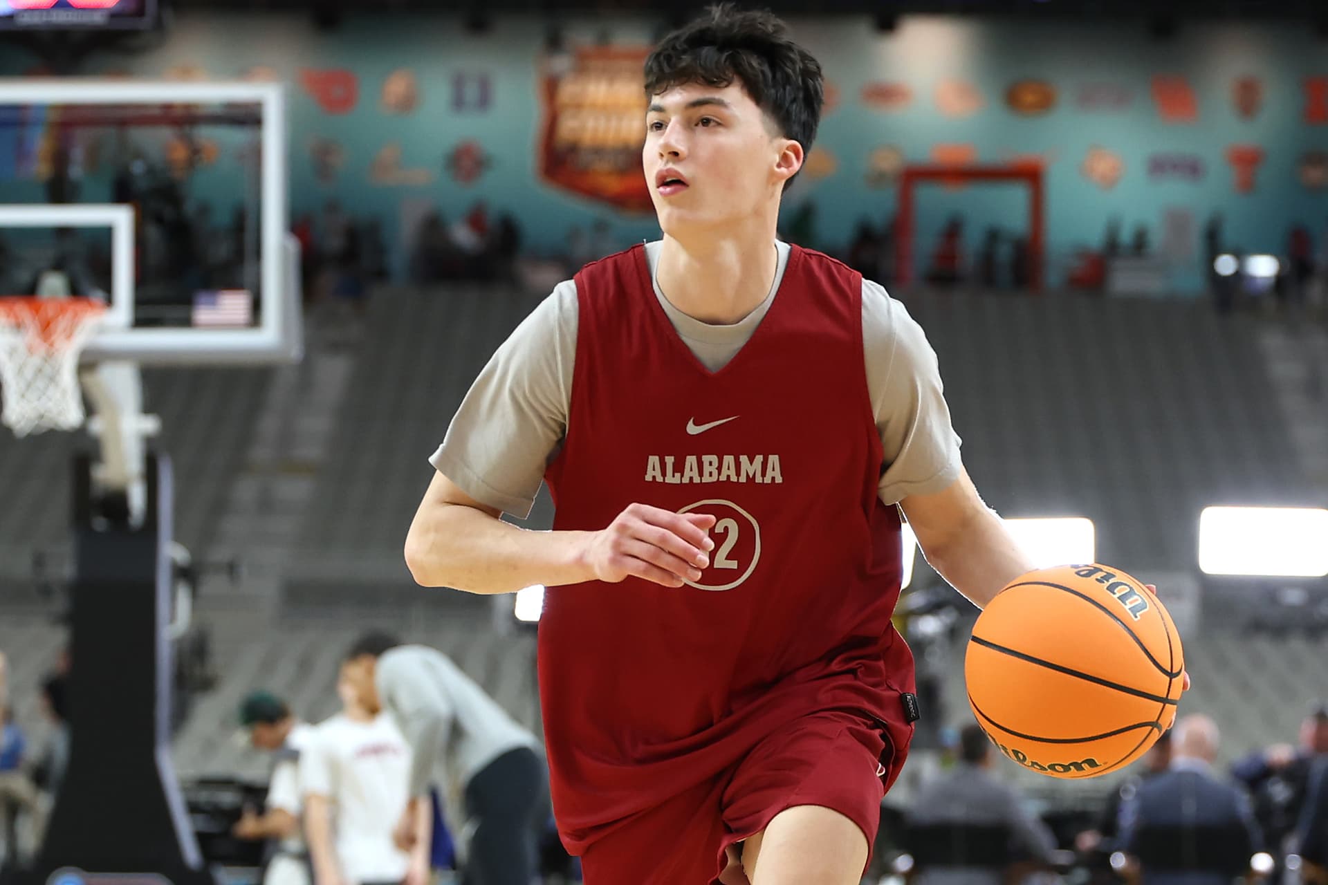 Christian Petersen/Getty Images Kai Spears, then with the Alabama Crimson Tide, dribbles the ball during a practice session at Glendale, Arizona, on April 5, 2024.