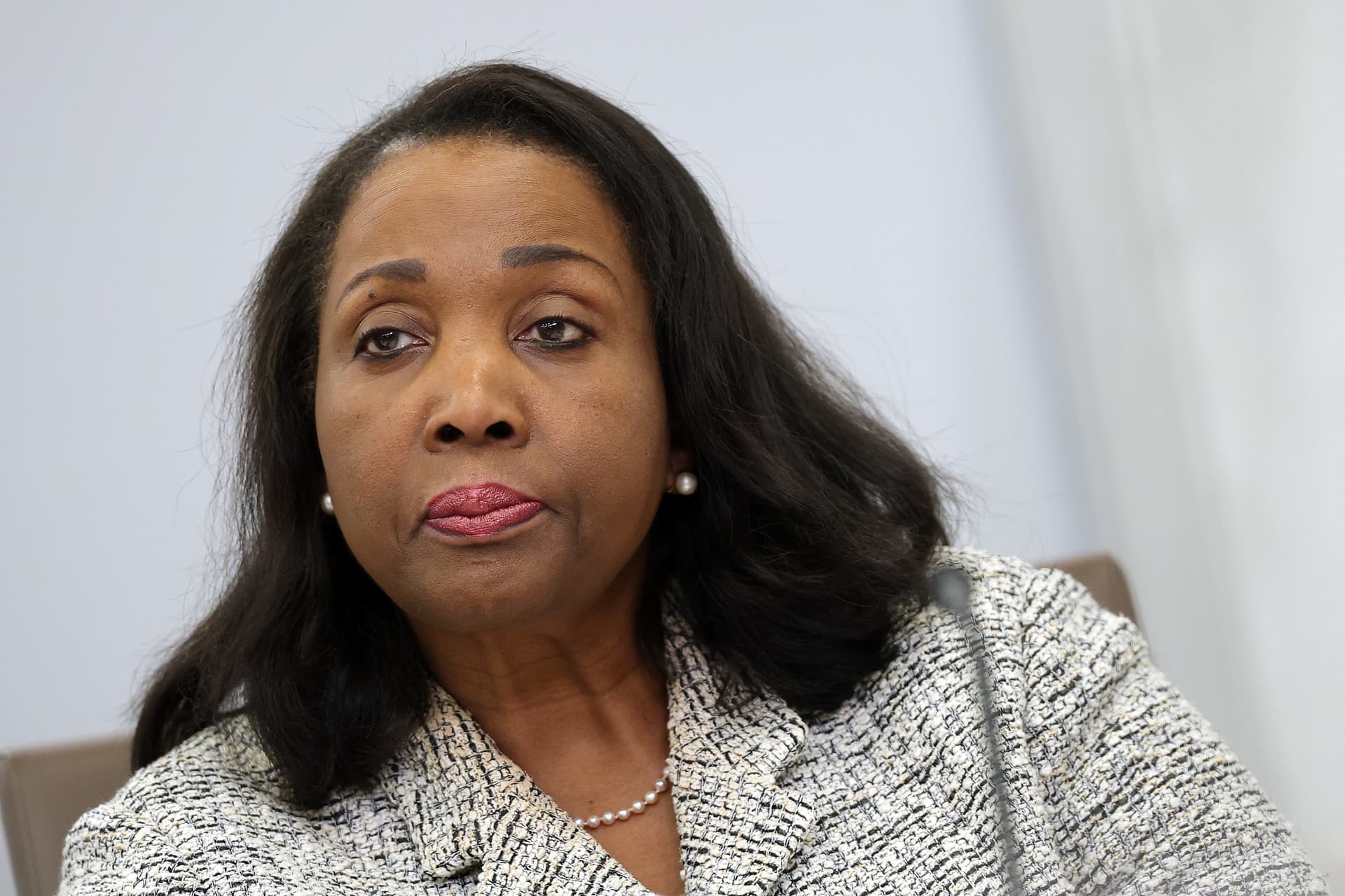 Kevin Dietsch/Getty Images A Federal Reserve Board governor, Lisa Cook, participates in a board meeting at Washington, D.C., on March 19, 2026.