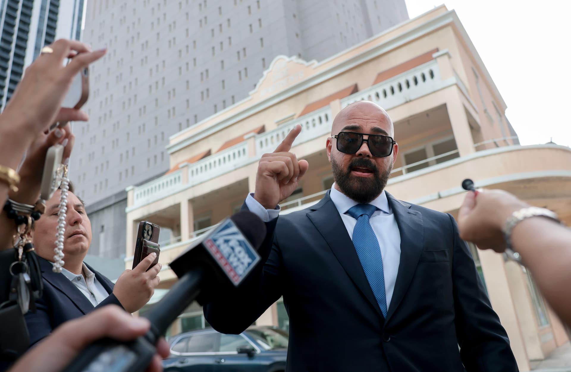 Joe Raedle/Getty Images The lead counsel for Andrew and Tristan Tate, Joseph McBride, speaks to reporters outside a federal courthouse at Miami, Florida, on July 20, 2026.