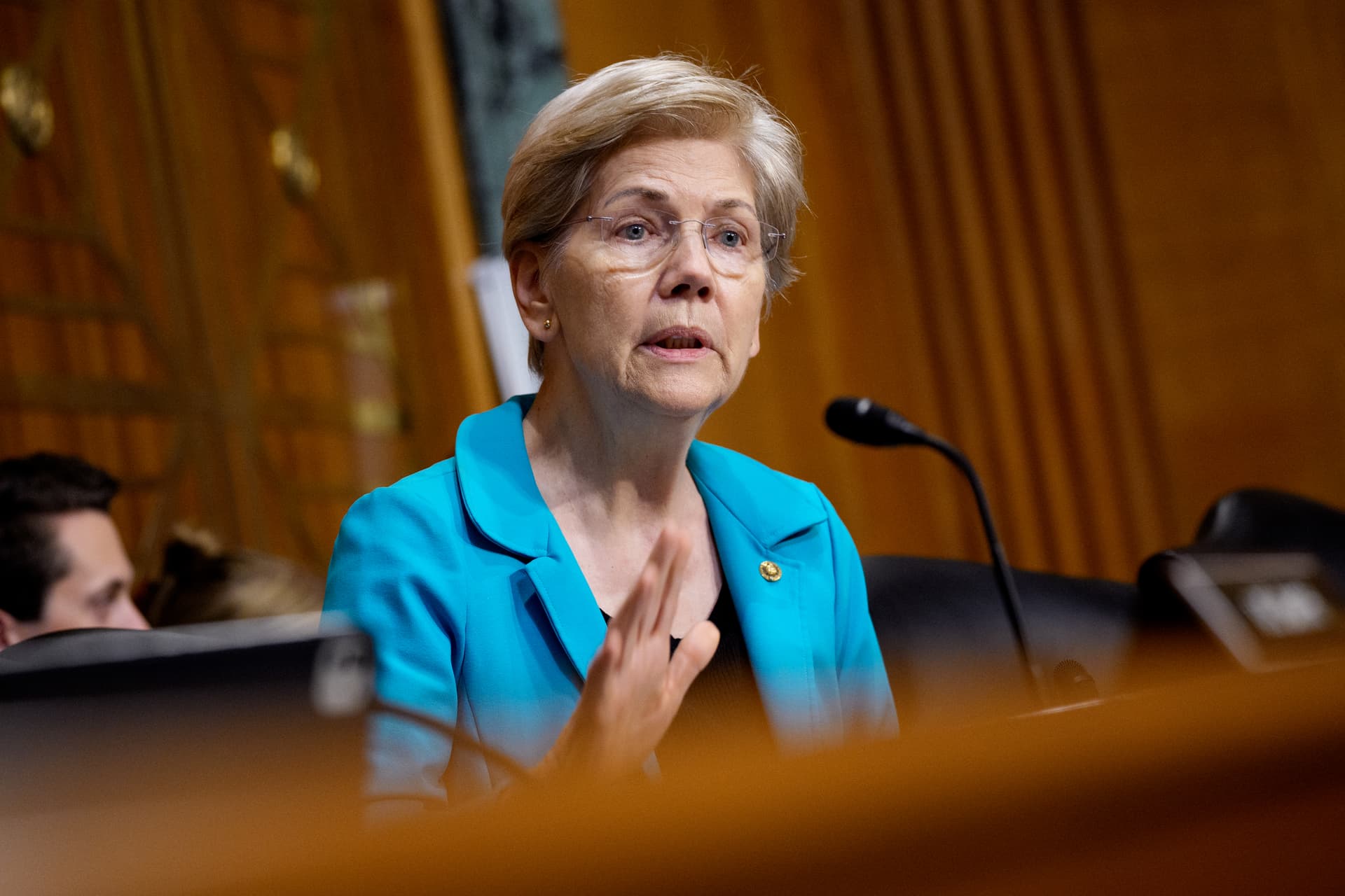 Andrew Harnik/Getty Images Senator Elizabeth Warren speaks to United States Trade Representative Jamieson Greer as he appears at a Senate Finance Committee hearing at Washington, D.C., on July 22, 2026.