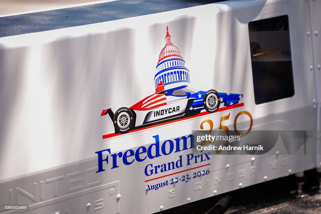 Andrew Harnik/Getty Images A Freedom 250 Grand Prix logo is visible before a showcase event with President Trump on West Executive Avenue between the West Wing of the White House and the Eisenhower Executive Office Building.