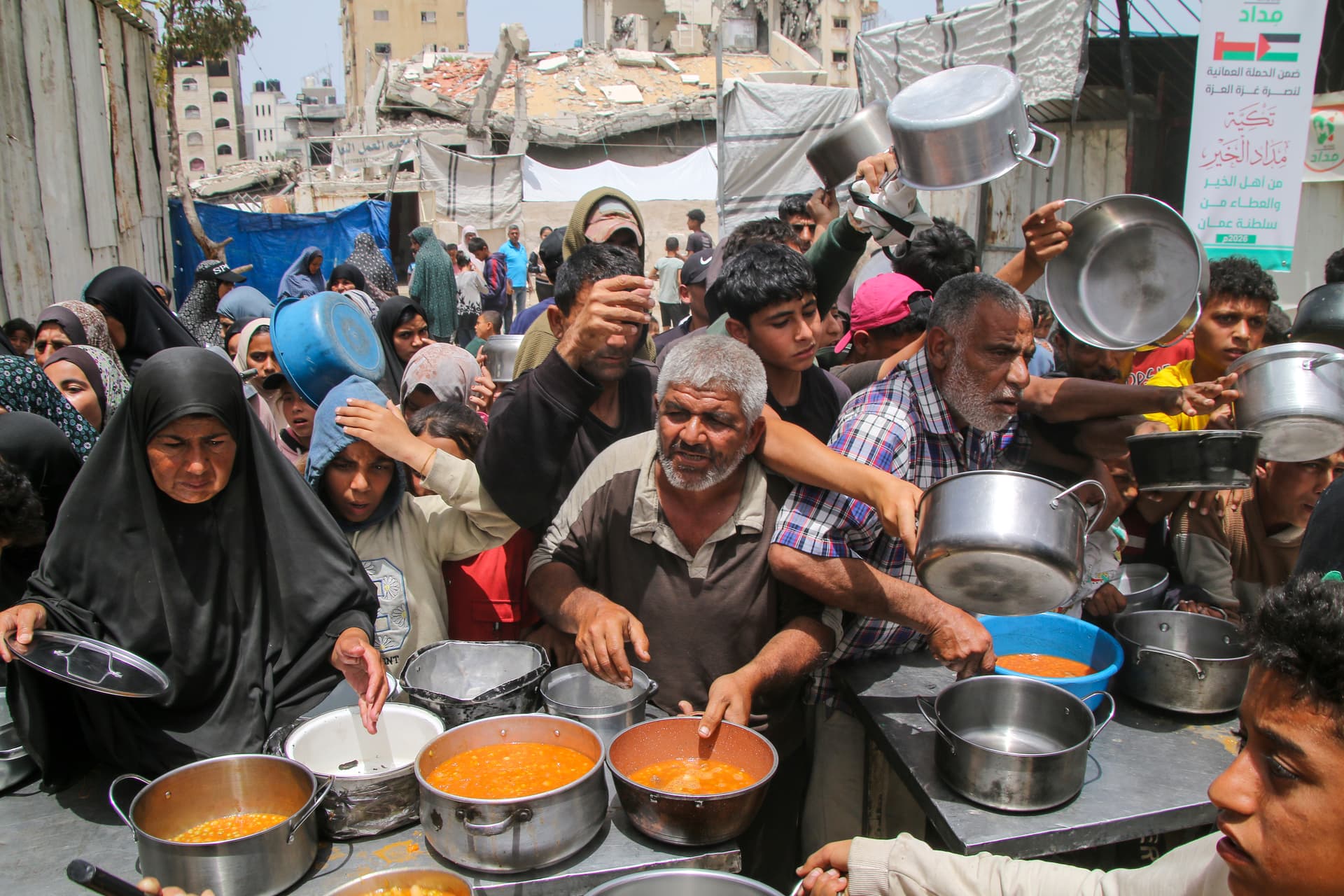 Ahmad Hasaballah/Getty Images Food aid is distributed on May 17, 2026 at Gaza City.