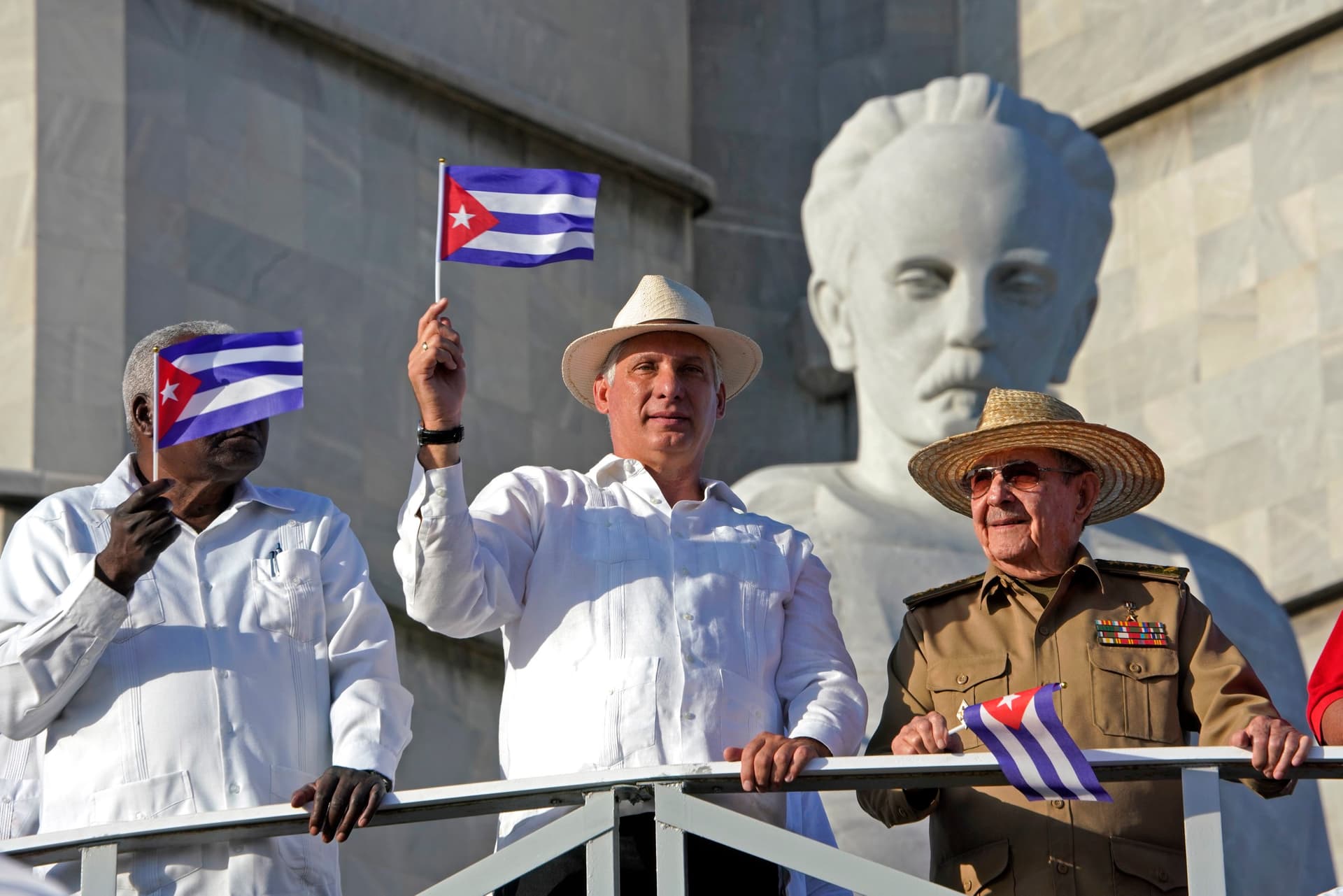 Sven Creutzmann/Mambo photo/Getty Images President Miguel-Diaz, of Cuba, center, next to Raul Castro, right, at Havana's Revolution square, May 1, 2019.