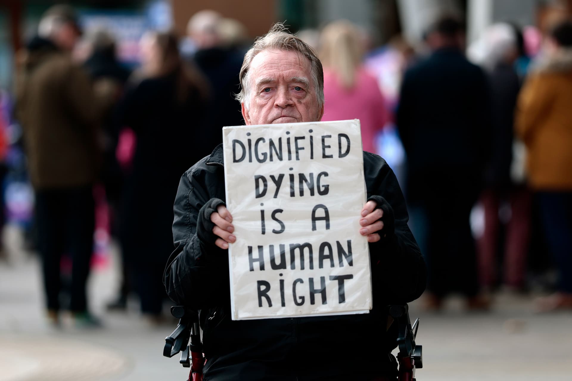 Jeff J Mitchell/Getty Images Protesters at a Dignity in Dying rally.