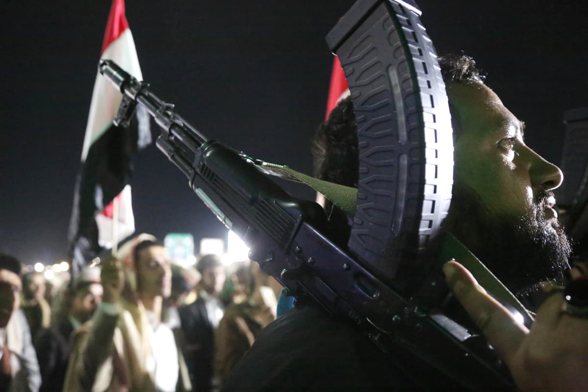 Mohammed Hamoud/Getty Images Followers of Yemen's Houthi participate in a rally to celebrate the group's takeover of the strategic port city of Mocha and the Bab El-Mandeb Strait.