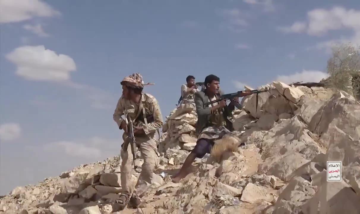 Houthi Media Center via Getty Images Houthi fighters attack Saudi-backed forces in Al Jawf province, Yemen.