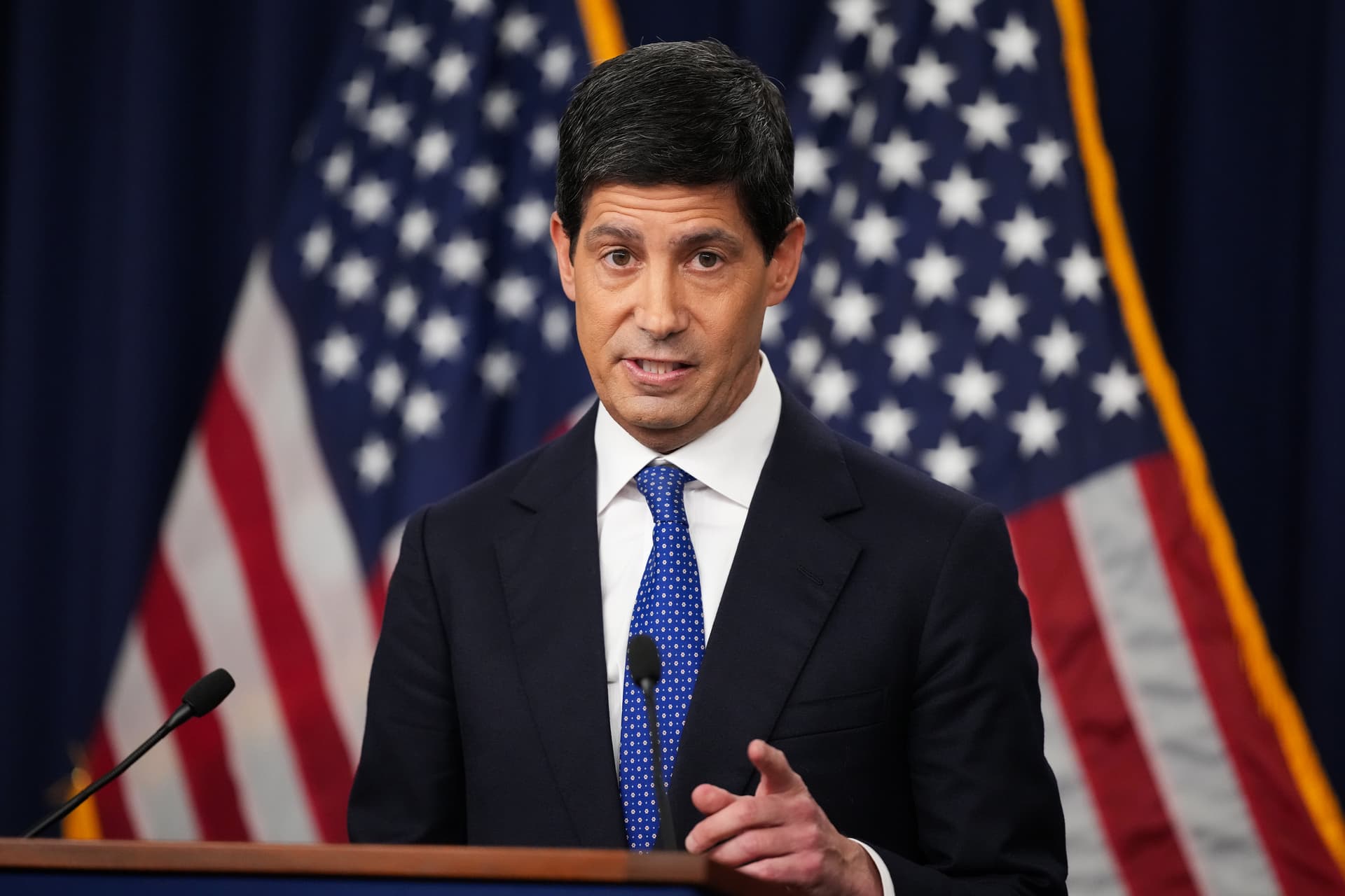 Andrew Harnik/Getty Images Federal Reserve Chair Kevin Warsh speaks after raising interest rates.